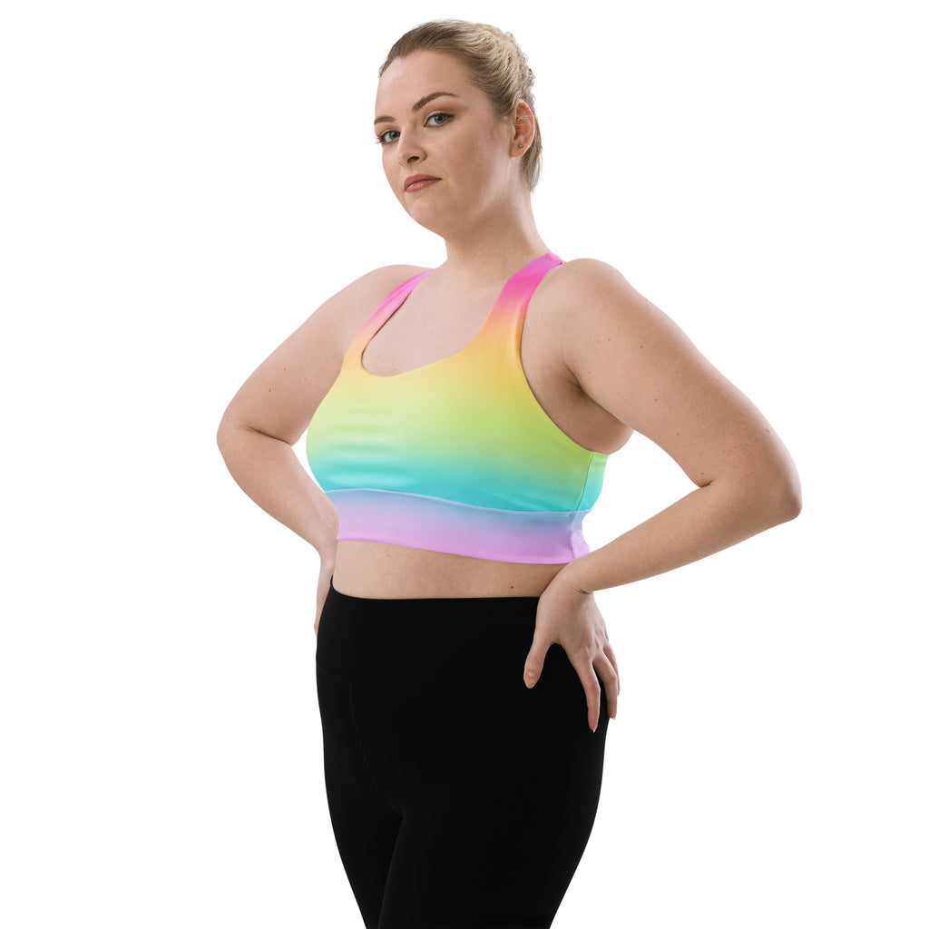 Women’s bright rainbow longline sports bra in pink yellow green and purple buttery soft recycled fabric with high support