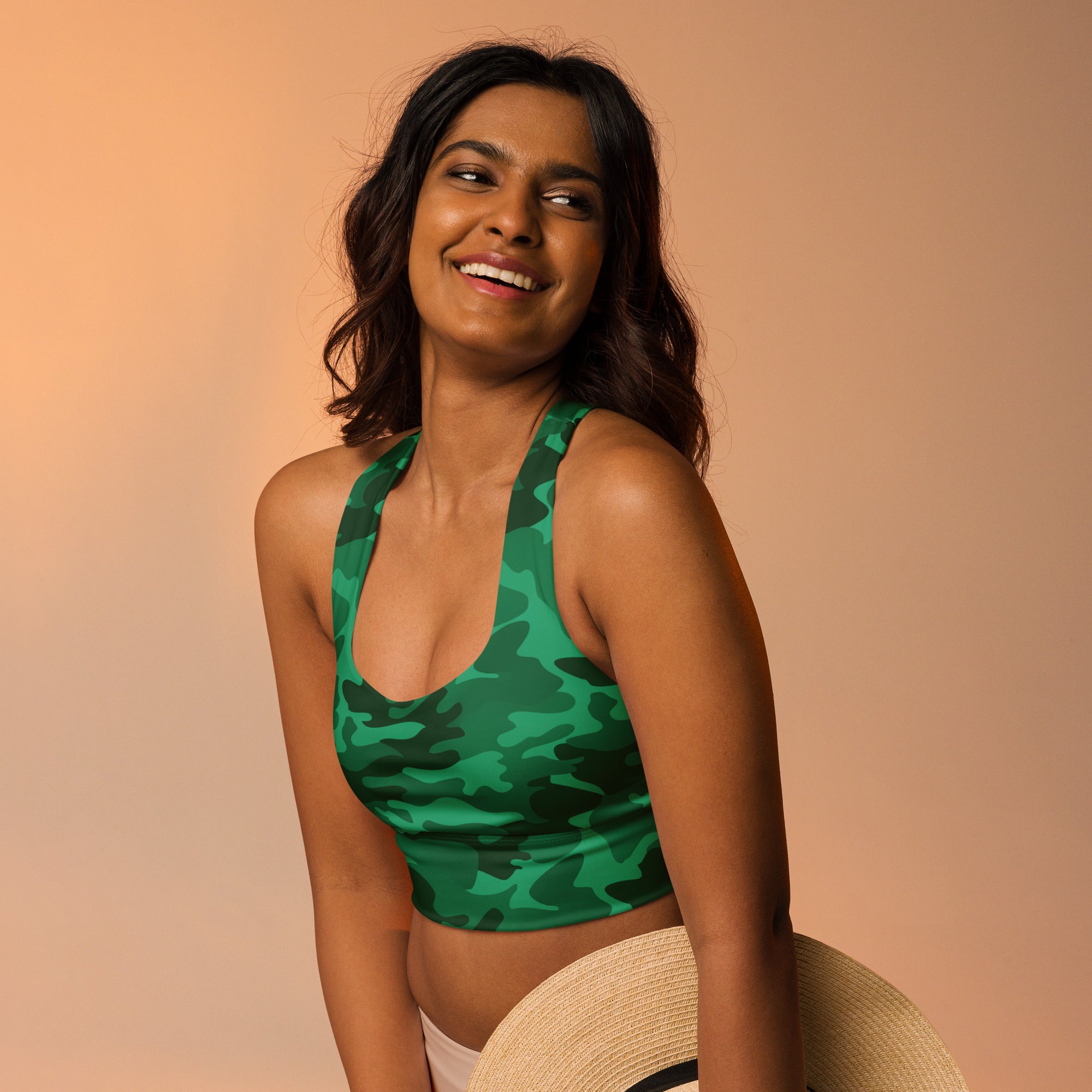 Women’s green camouflage recycled longline sports bra with high intensity support and quick dry fabric