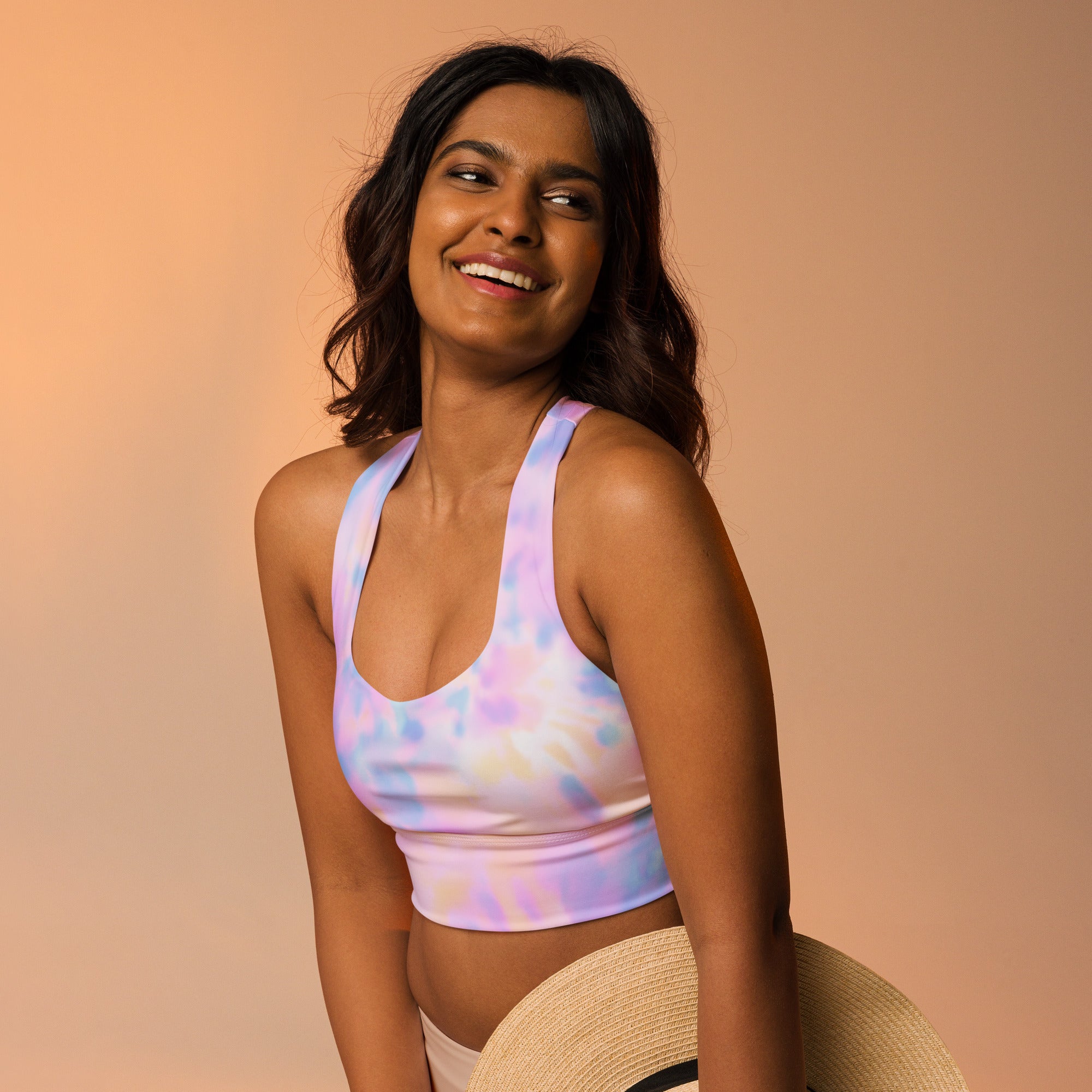 Women’s pastel tie-dye crop top with halter neck made from soft stretchy fabric for high intensity support and quick dry