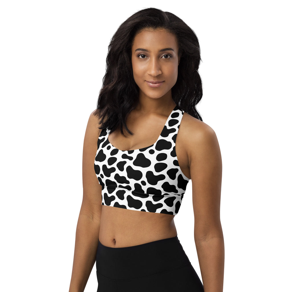 Women’s cow print buttery soft recycled longline sports bra black and white with high intensity support