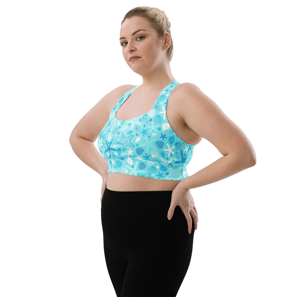 Women’s light blue longline sports bra with starfish shell ocean pattern buttery soft recycled fabric high support