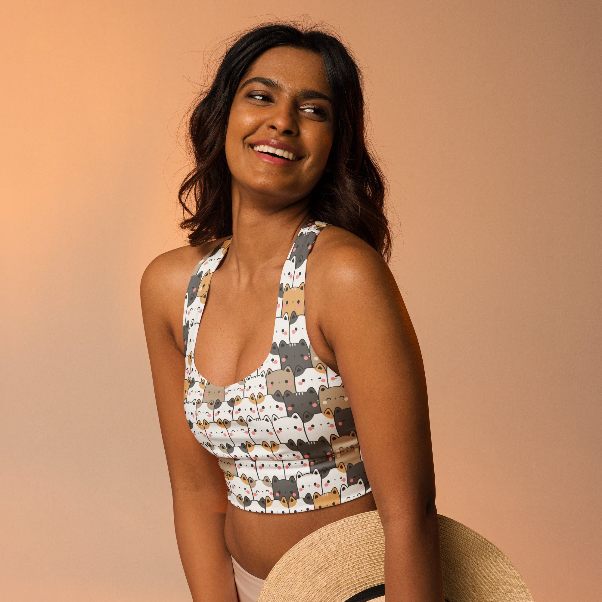 Women’s kawaii cat white crop top sports bra with buttery soft recycled fabric and playful gray beige black cats pattern