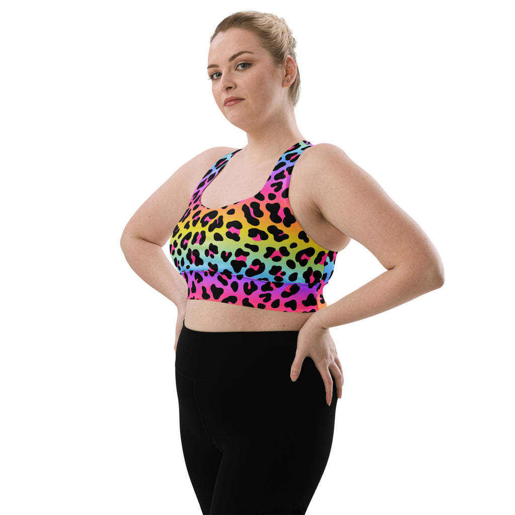 Women’s rainbow-colored leopard print buttery soft recycled longline sports bra with black spots and racerback straps