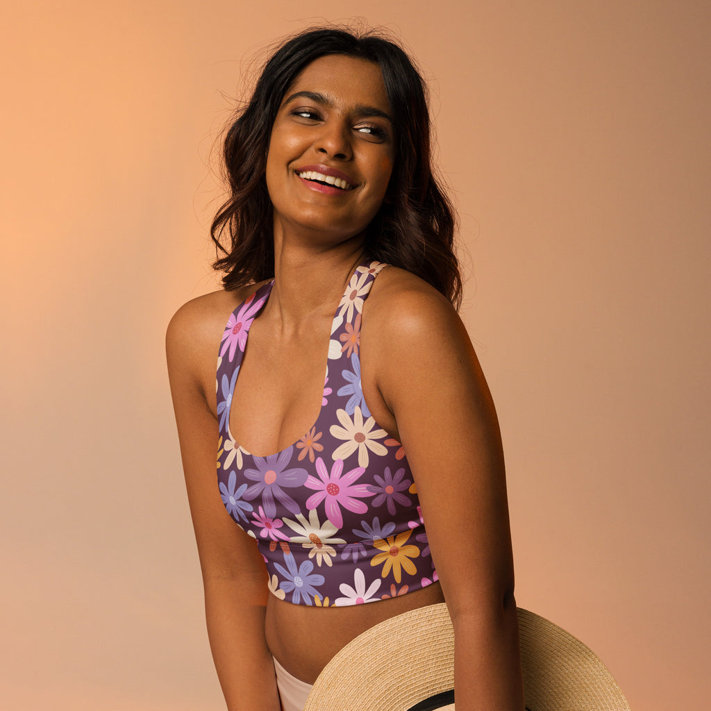 Women’s purple floral buttery soft recycled longline sports bra with halter neckline and colorful daisy pattern
