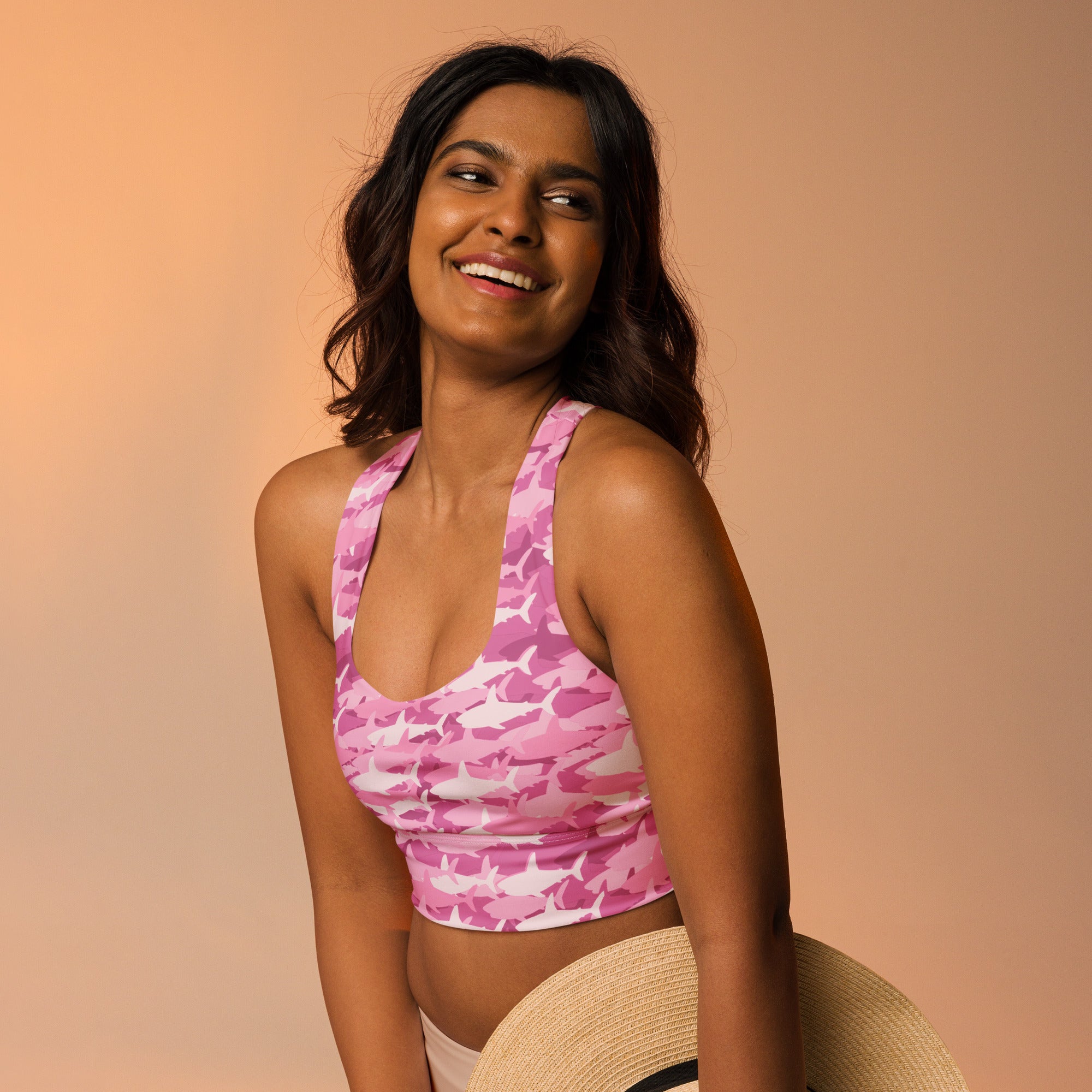 Women’s pink and white shark camouflage longline sports bra with high intensity support and quick dry fabric