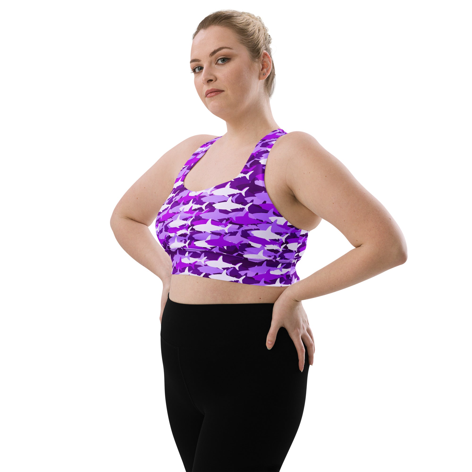 Women’s purple and white shark-patterned recycled longline sports bra with high intensity support and quick dry fabric