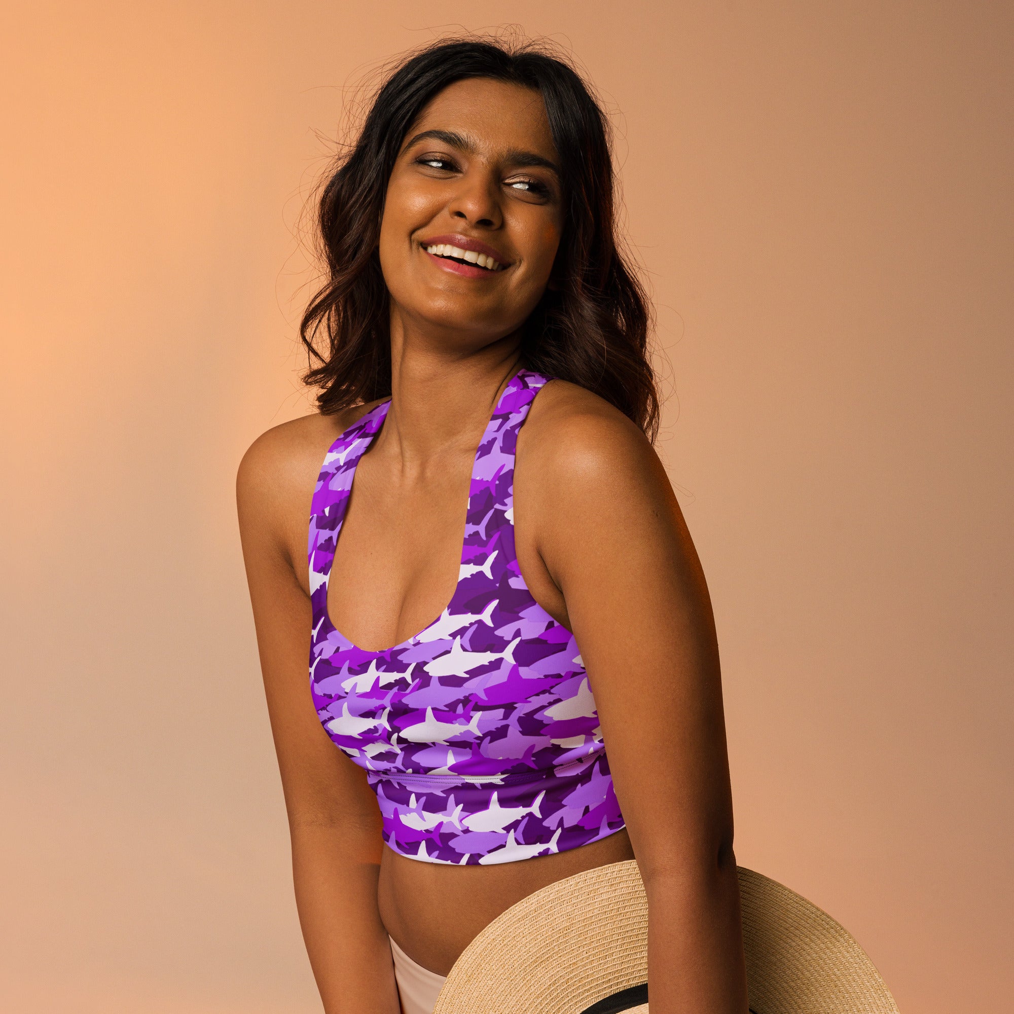 Women’s purple and white shark pattern halter top made from buttery soft recycled fabric with high intensity support