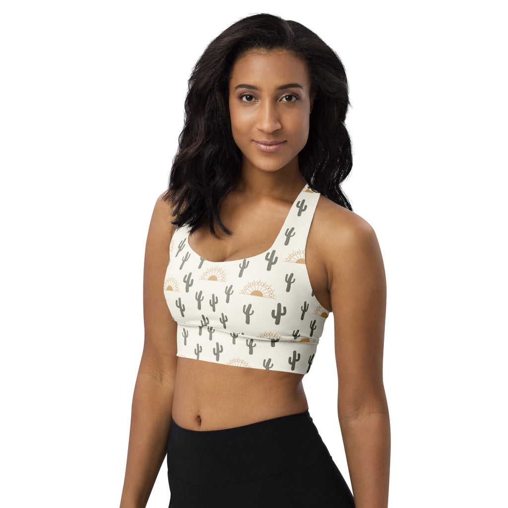 Women’s white longline sports bra with black cactus and gold sun pattern buttery soft recycled fabric high support