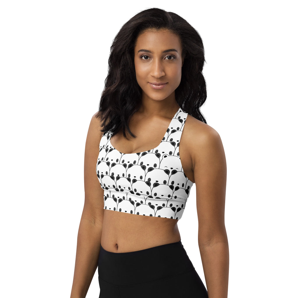 White womens longline sports bra with black panda face pattern buttery soft recycled fabric high intensity support