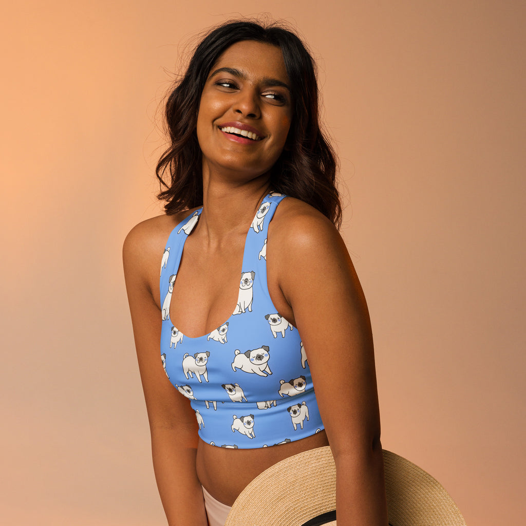 Women’s blue longline sports bra with white pug pattern buttery soft recycled fabric high intensity support