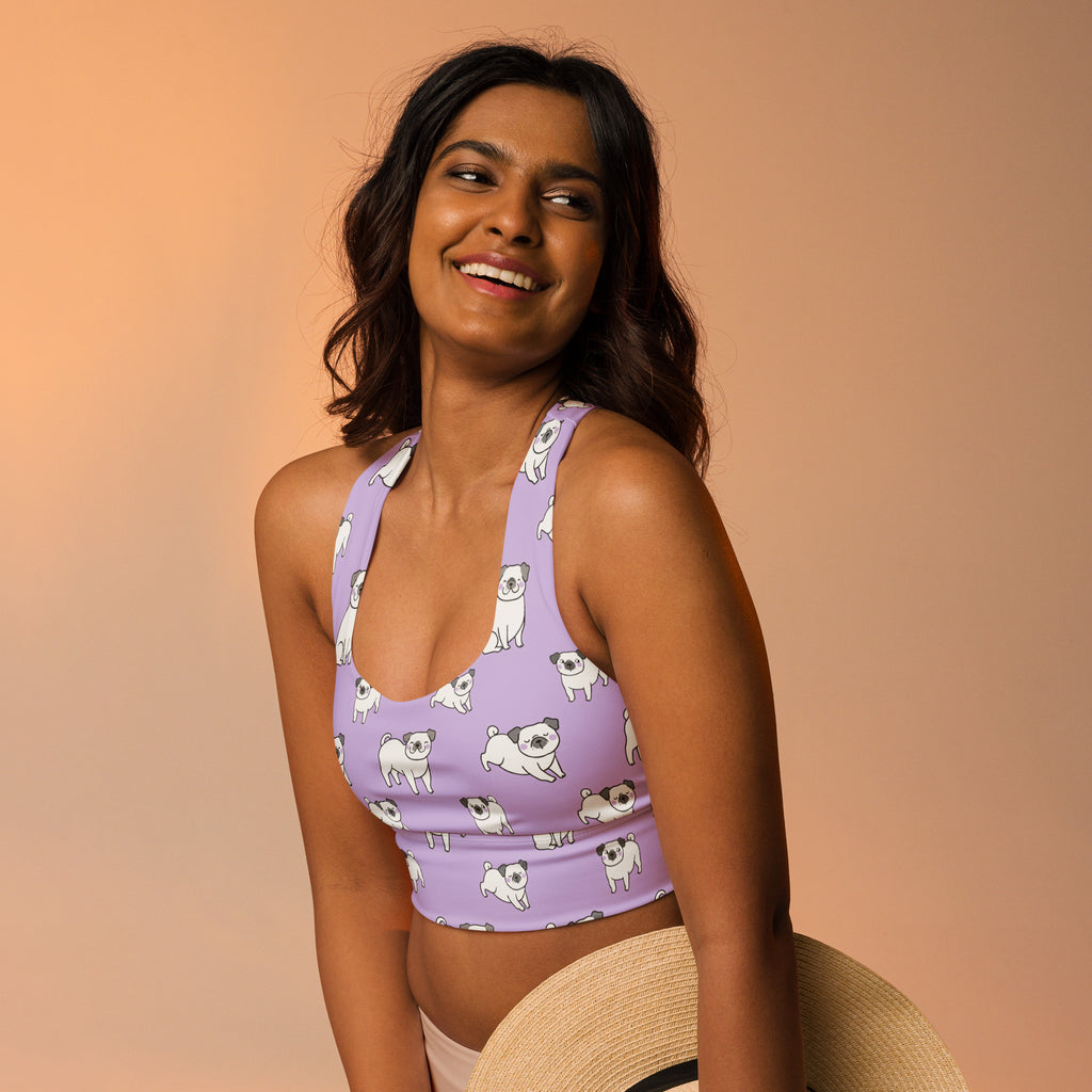 Women’s purple longline sports bra with white pug illustrations buttery soft recycled fabric high intensity support