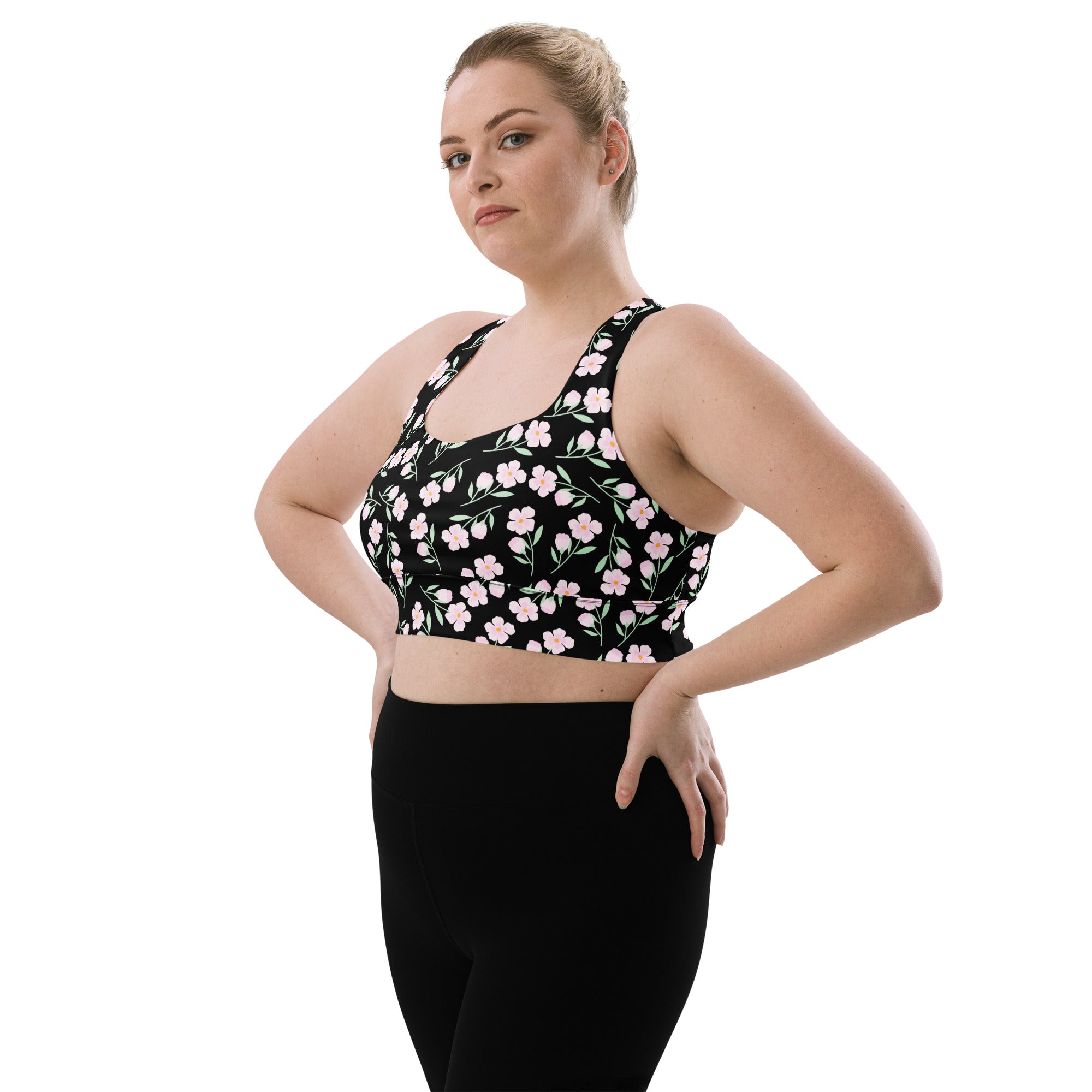Women’s black floral print buttery soft recycled longline sports bra with pink blossoms for high intensity support