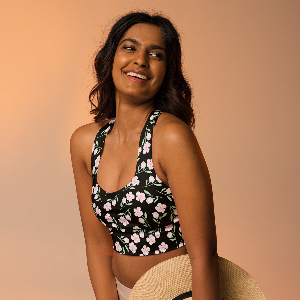 Women’s black halter top sports bra with pink floral print buttery soft recycled fabric and high intensity support