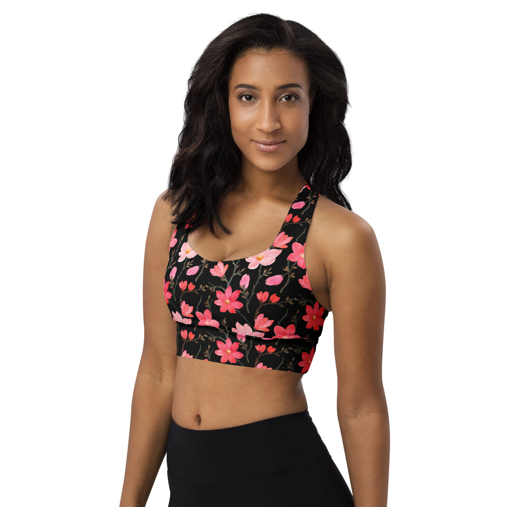 Women’s midnight floral buttery soft recycled black sports bra with pink and red blossoms for high intensity support
