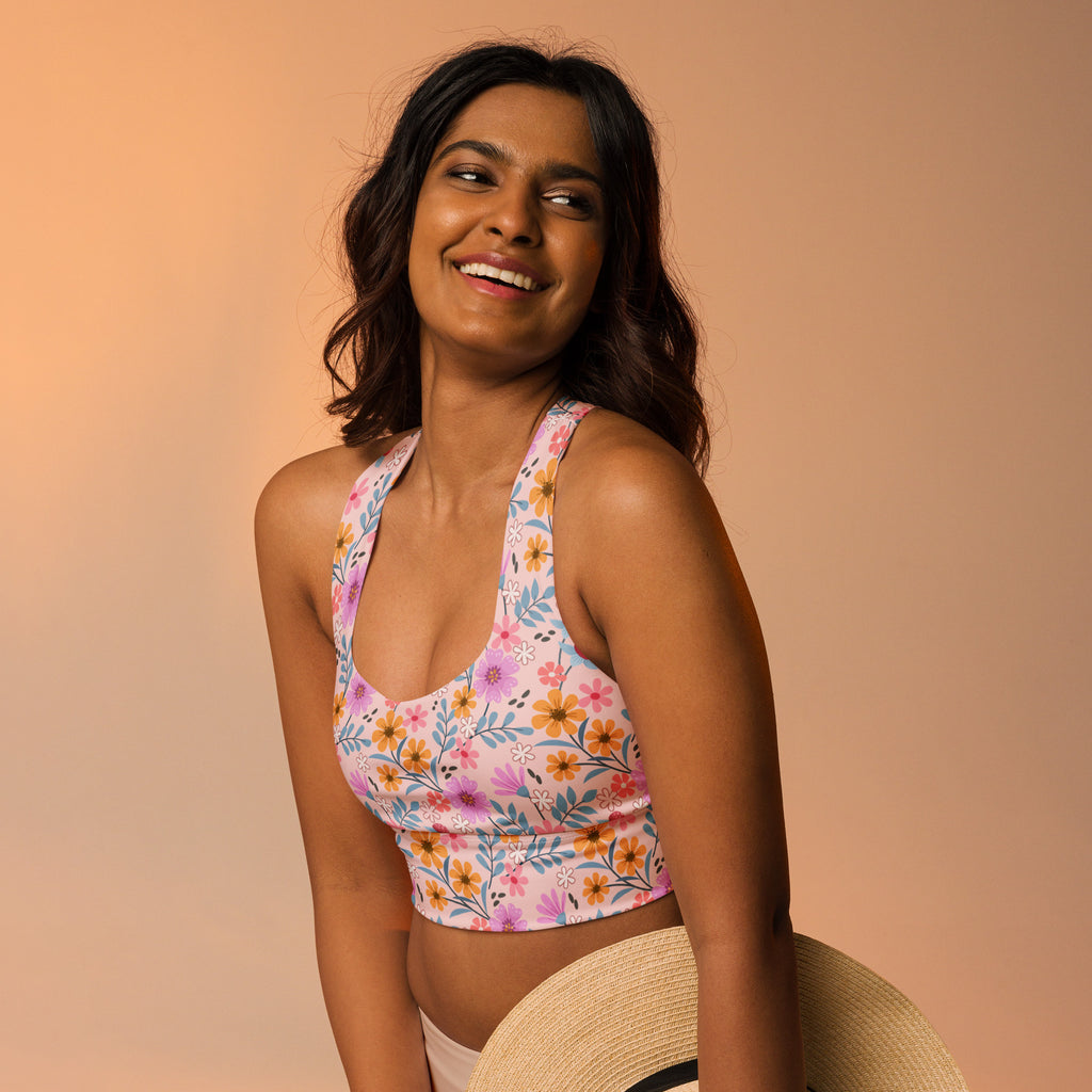 Women’s pink floral buttery soft recycled crop top with halter neck and scoop neckline for high intensity support