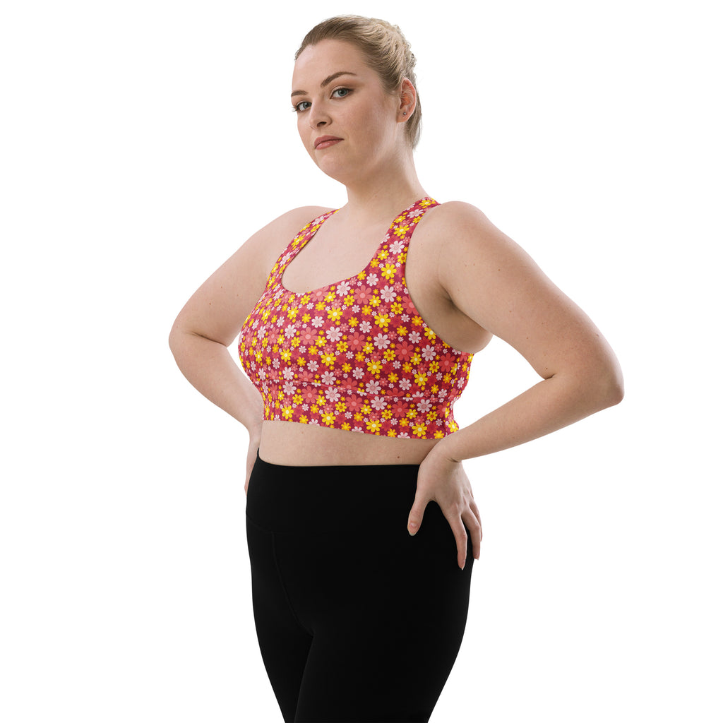 Women’s red floral buttery soft recycled longline sports bra with vibrant pink and yellow print high intensity support