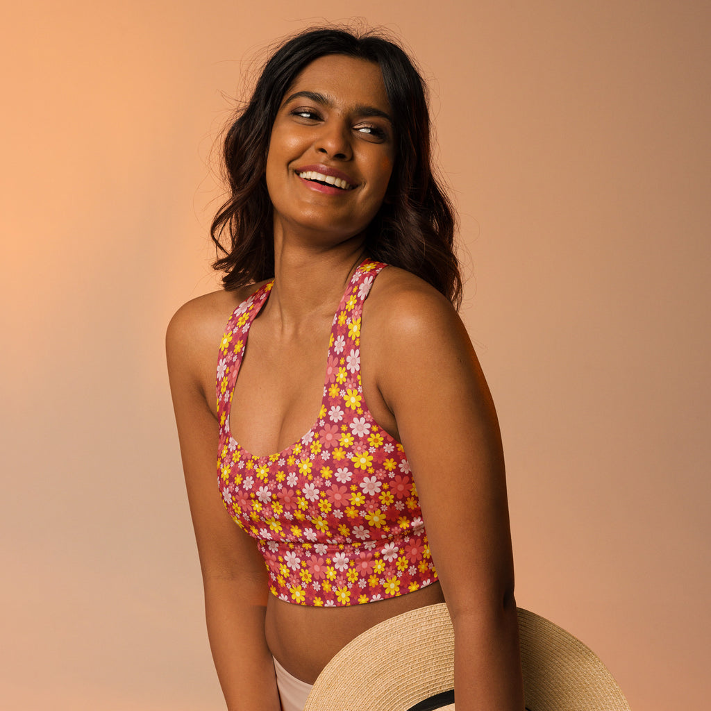 Women’s red floral buttery soft recycled longline sports bra with vibrant pink and yellow floral halter top design