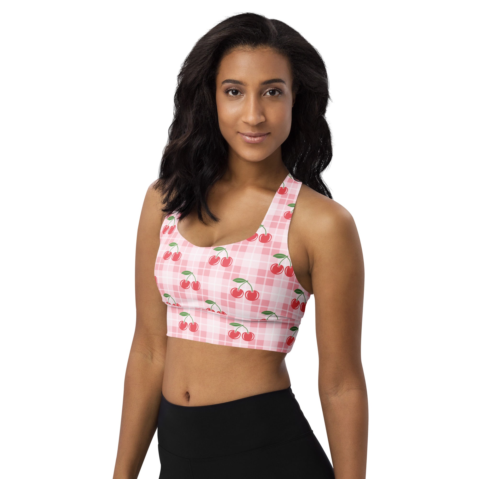 Women’s pink and white checkered longline sports bra with red cherries buttery soft recycled fabric and upf 50 plus