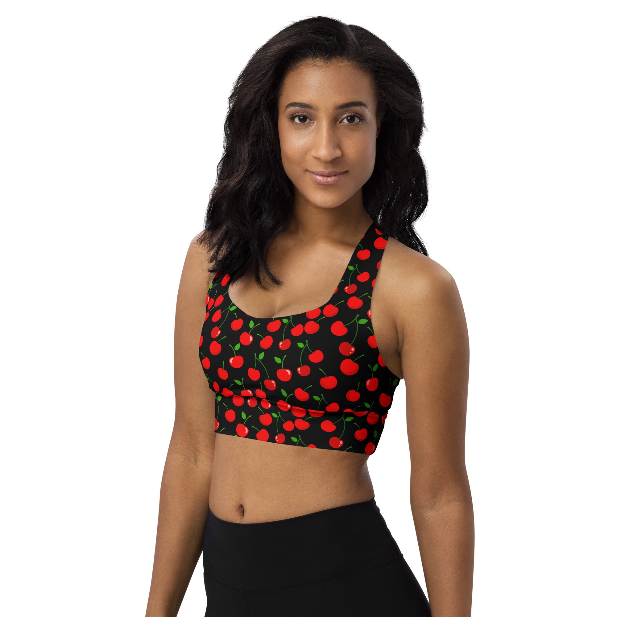 Women’s black cherry print buttery soft recycled longline sports bra with vibrant red cherry pattern and green leaves