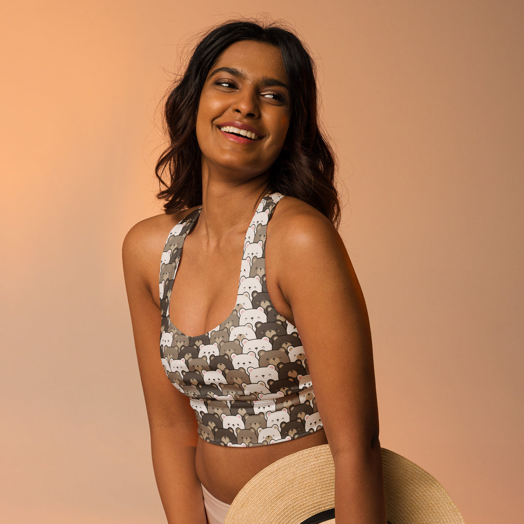 A stylish gray and white bear-patterned crop top halter neck sports bra with high intensity support and quick dry fabric