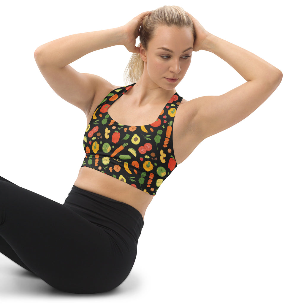 Black womens longline sports bra with vibrant colorful fruit and vegetable print buttery soft recycled fabric