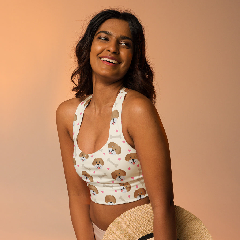 Women’s white recycled longline sports bra with brown puppy and bone patterns high intensity support quick dry upf 50+