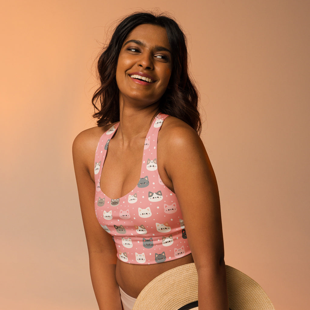 Women’s cute pink longline sports bra with white and gray cat faces buttery soft recycled fabric high intensity support