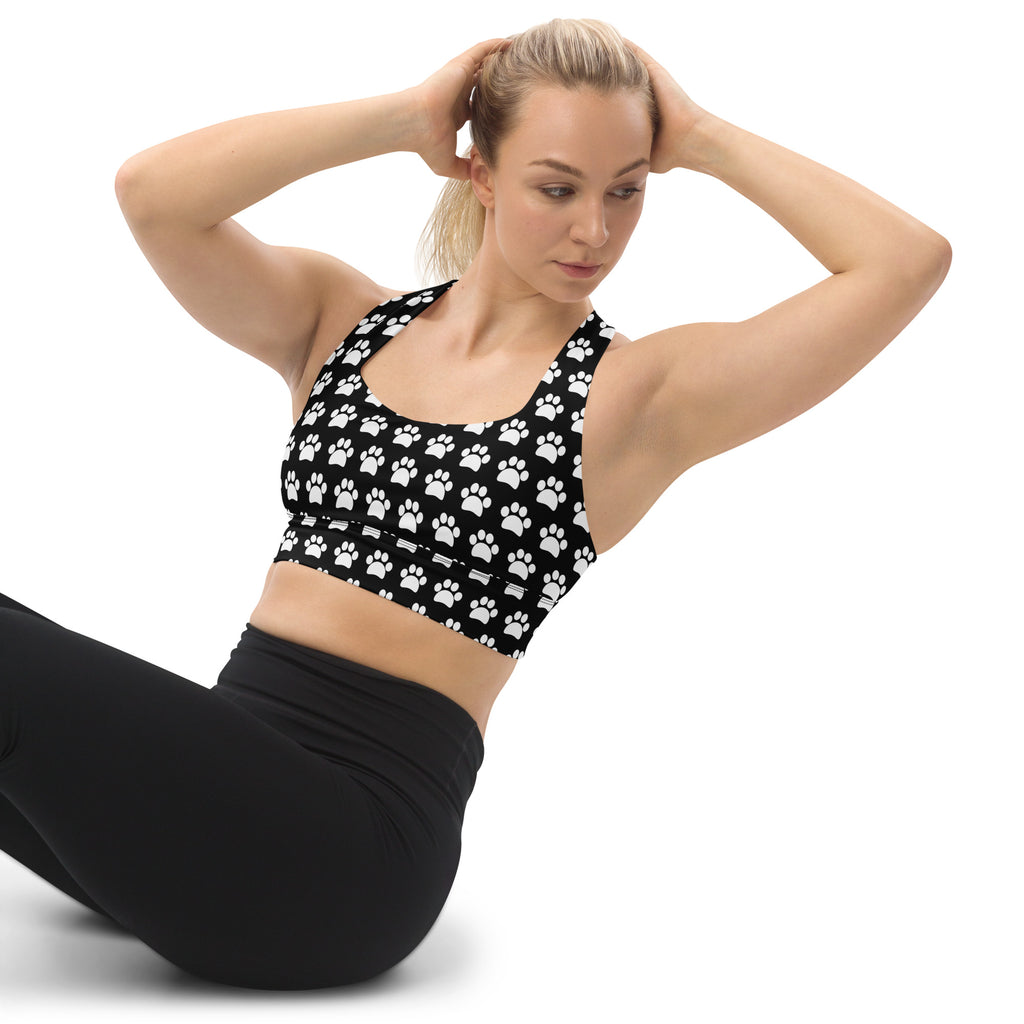Women’s black paw print buttery soft recycled longline sports bra with high intensity support and quick dry features