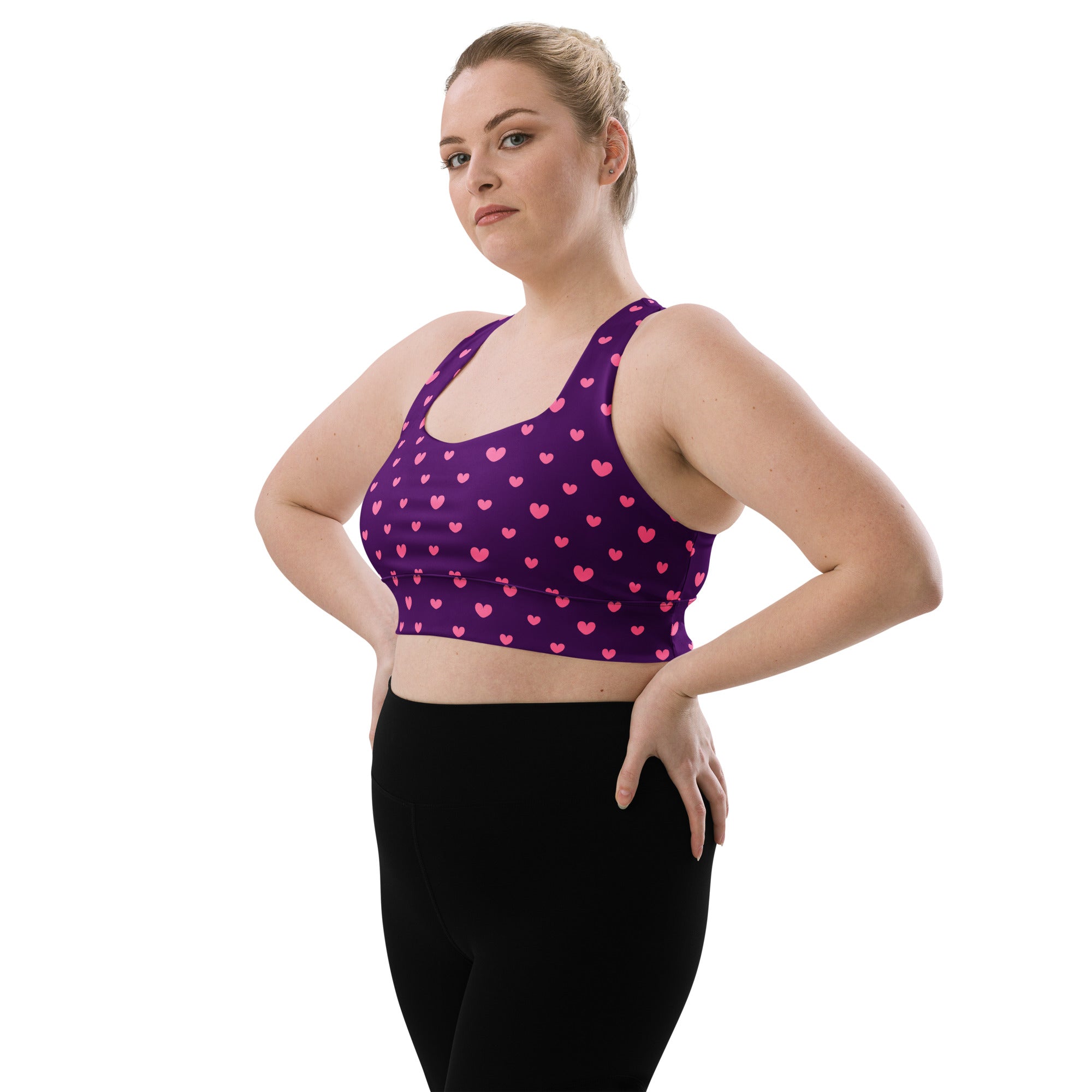 Women’s purple longline sports bra with pink heart pattern buttery soft recycled fabric high intensity support