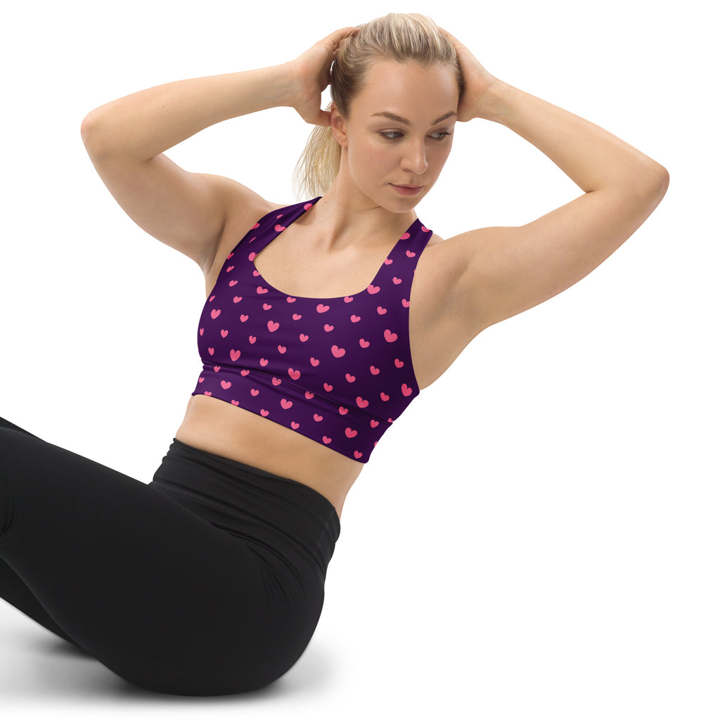 Women’s purple buttery soft recycled longline sports bra with pink heart pattern for high intensity support