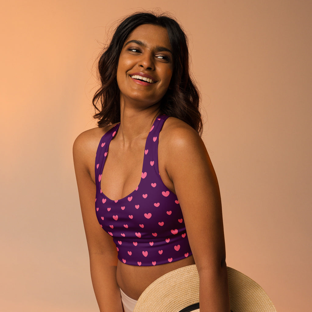 Women’s purple halter sports bra with pink heart patterns buttery soft recycled fabric high intensity support
