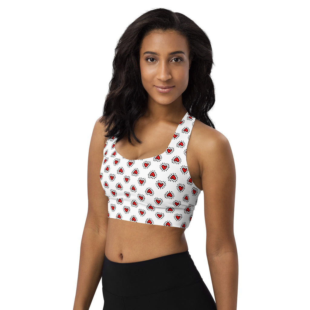 White longline sports bra with red heart doodle pattern and black lines, buttery soft recycled fabric, high support