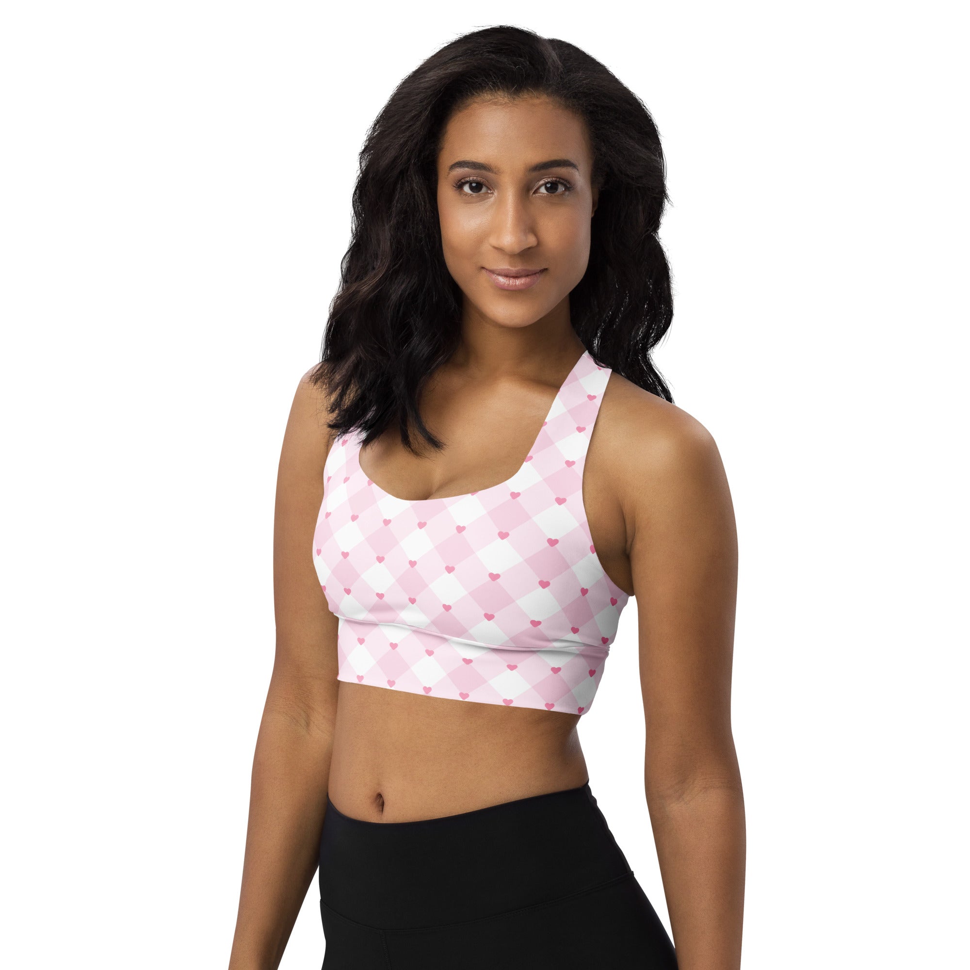 Women’s valentine’s day pink and white argyle heart longline sports bra with buttery soft recycled fabric and high support