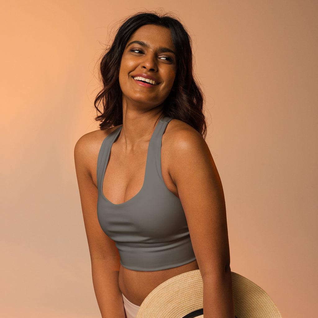 Gray halter-neck crop top made from buttery soft recycled fabric with high intensity support and quick dry features