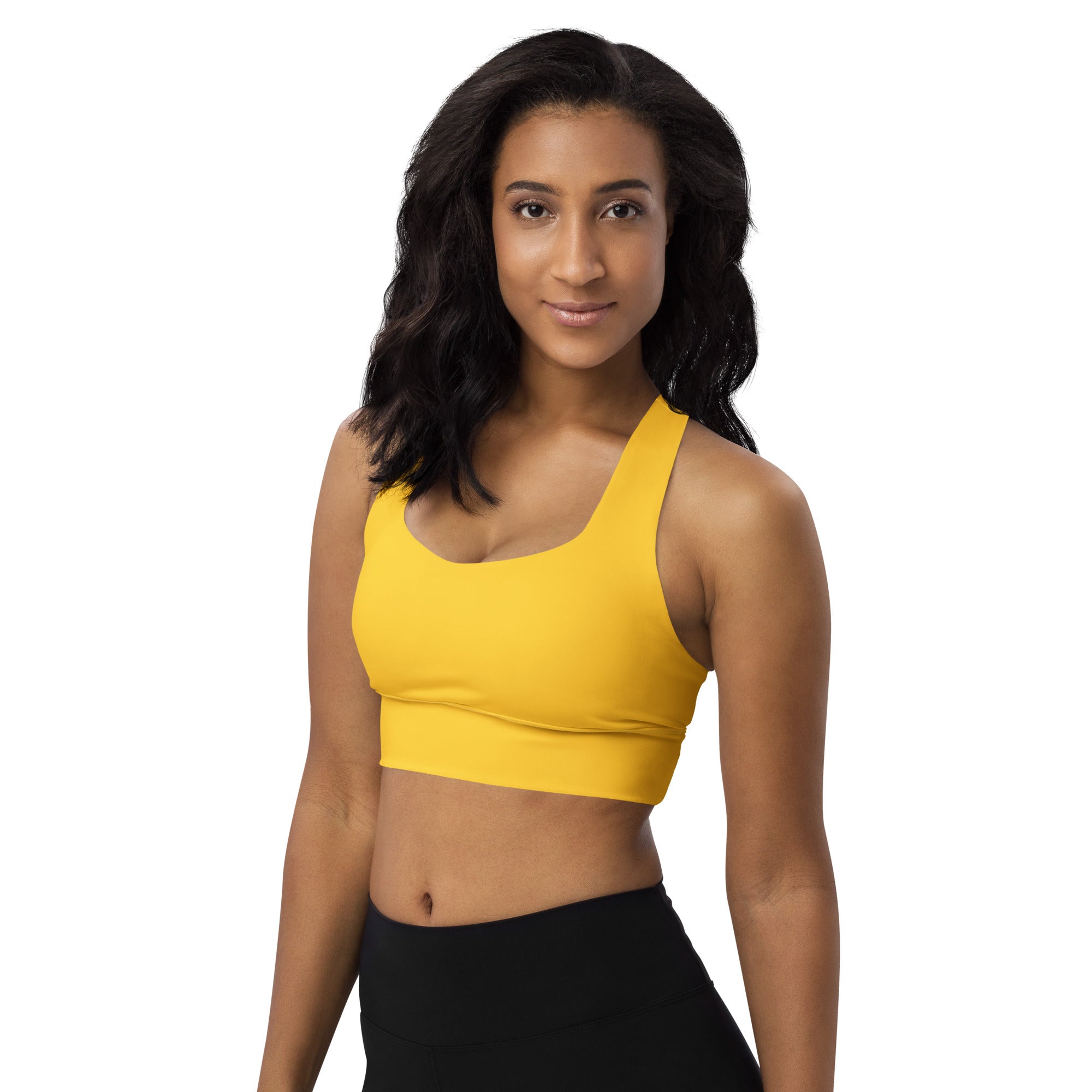 Bright yellow seamless recycled longline sports bra with wide straps and supportive band for high intensity support
