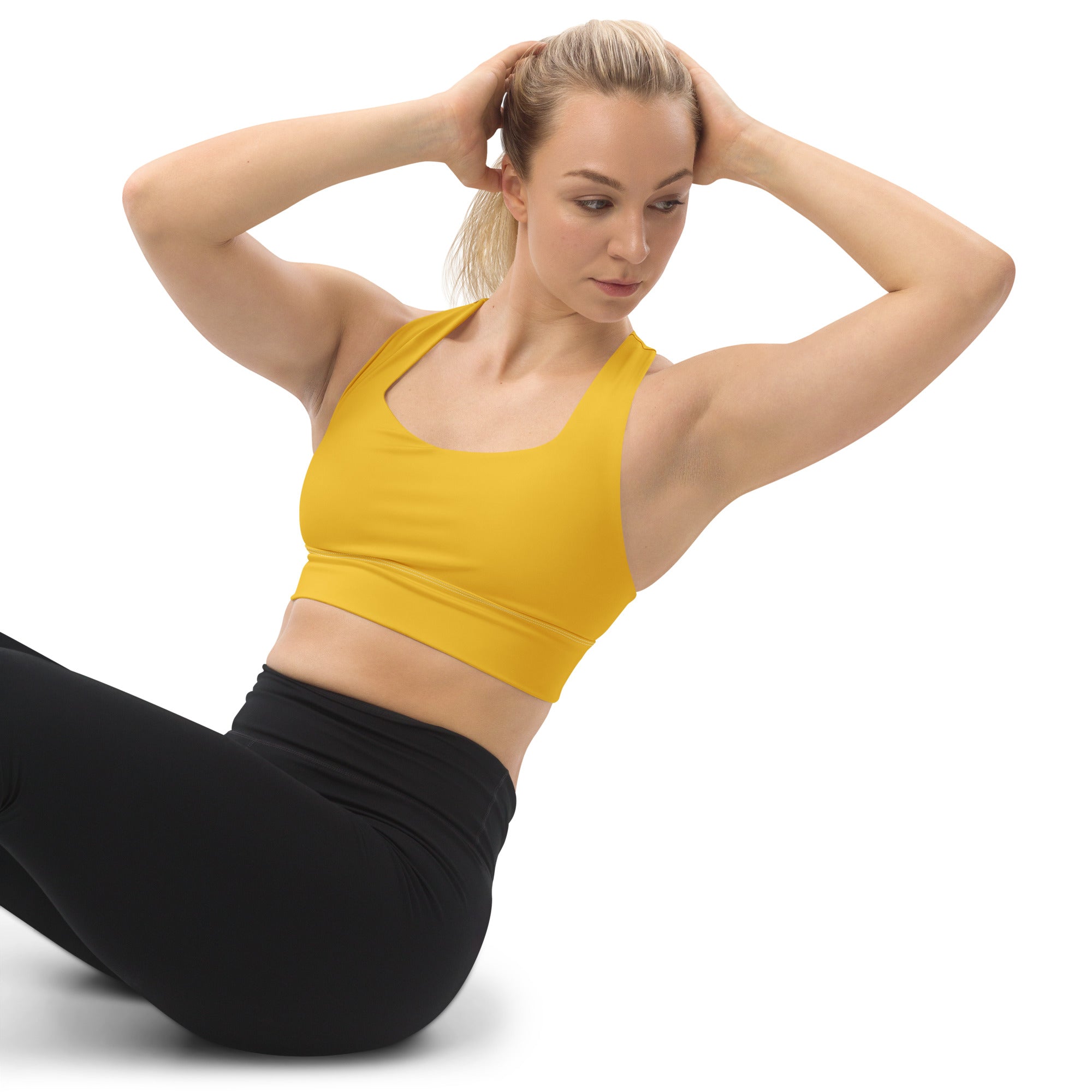 Women’s buttery soft yellow recycled sports bra with seamless design, wide straps, high intensity support, and quick dry