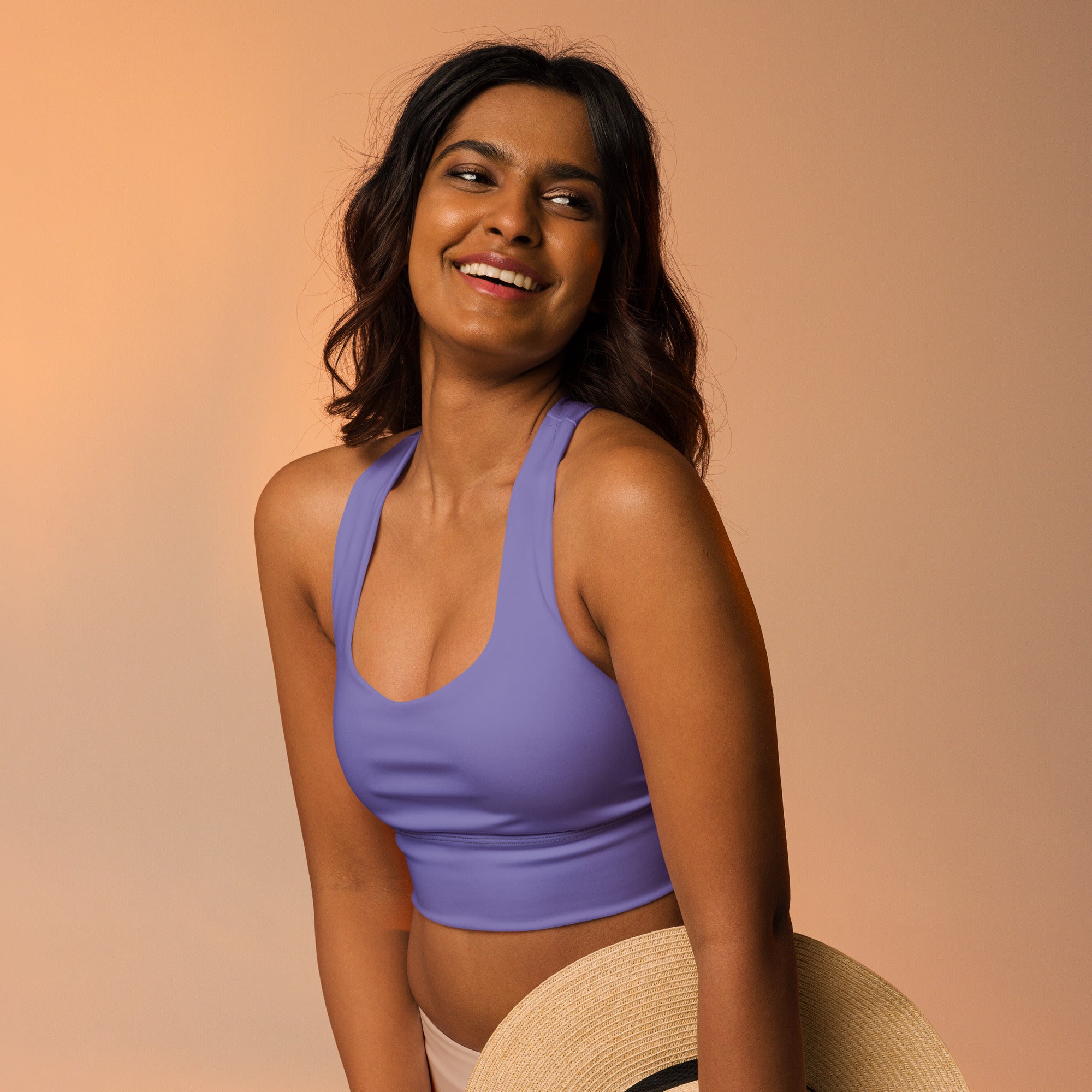 Lavender colored buttery soft recycled longline sports bra with thin straps quick dry upf 50 plus high intensity support