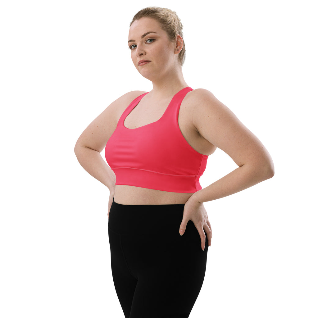 Women’s buttery soft coral pink recycled longline sports bra with racerback design for high intensity support