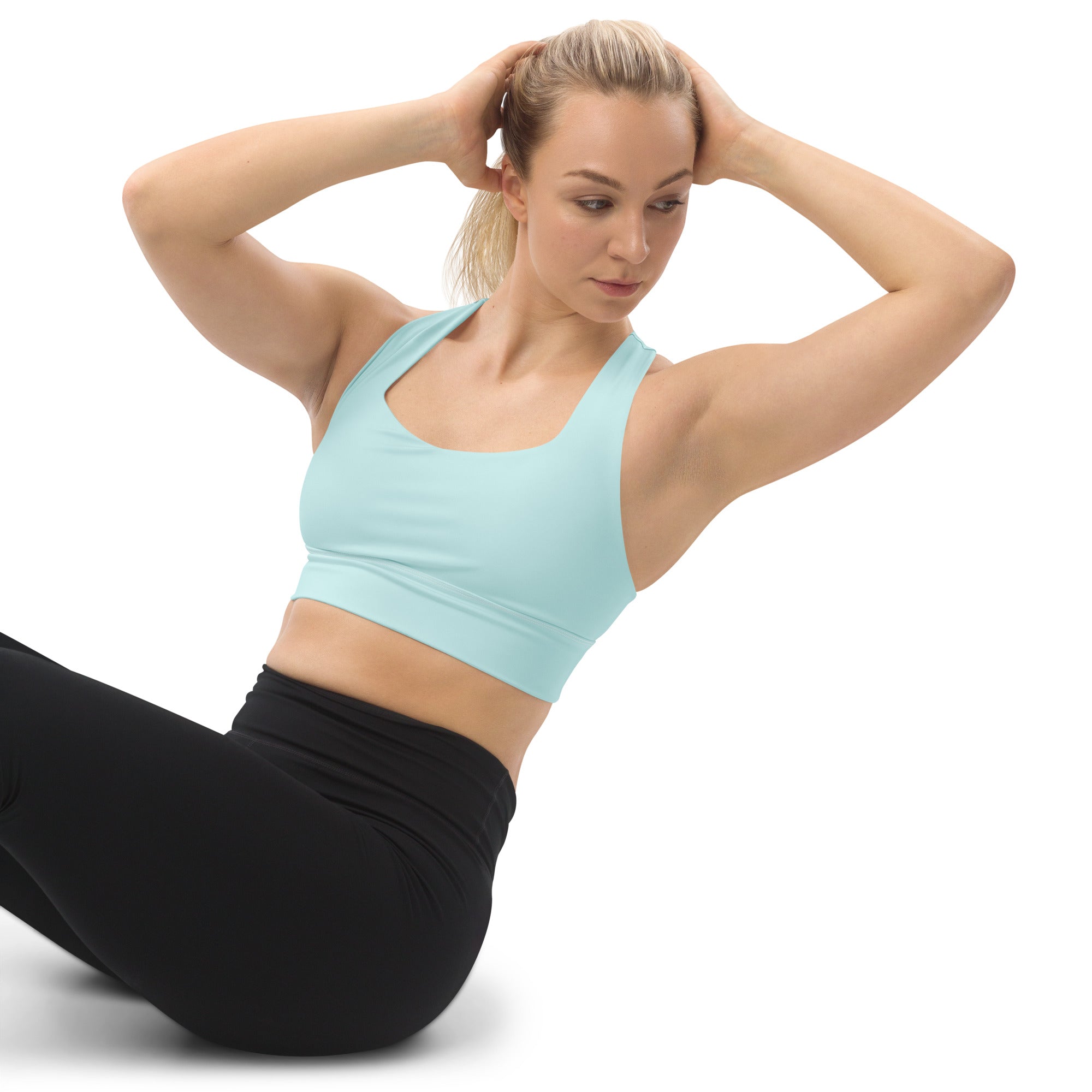 Light blue seamless sports bra with racerback design high intensity support quick dry and upf 50 plus