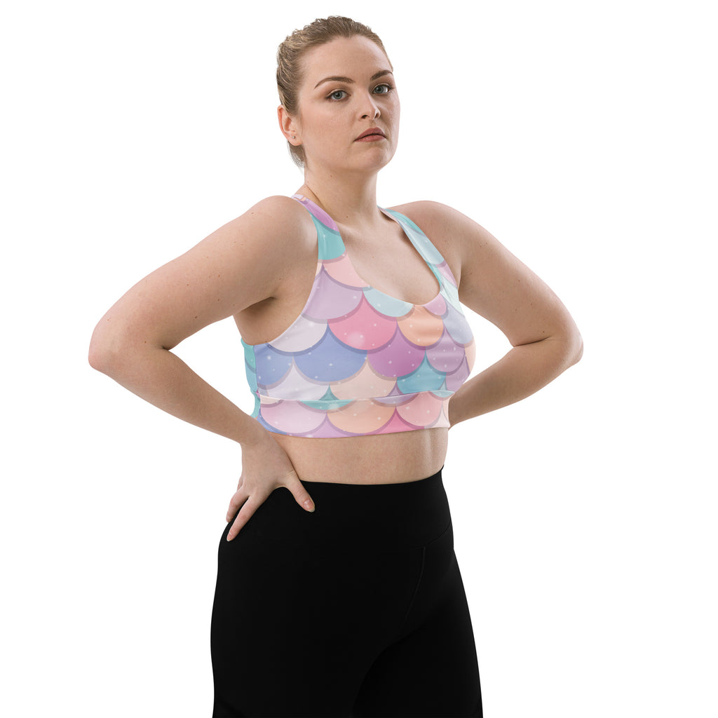 Pastel-colored mermaid scale pattern women’s longline sports bra with high intensity support and UPF 50 plus protection