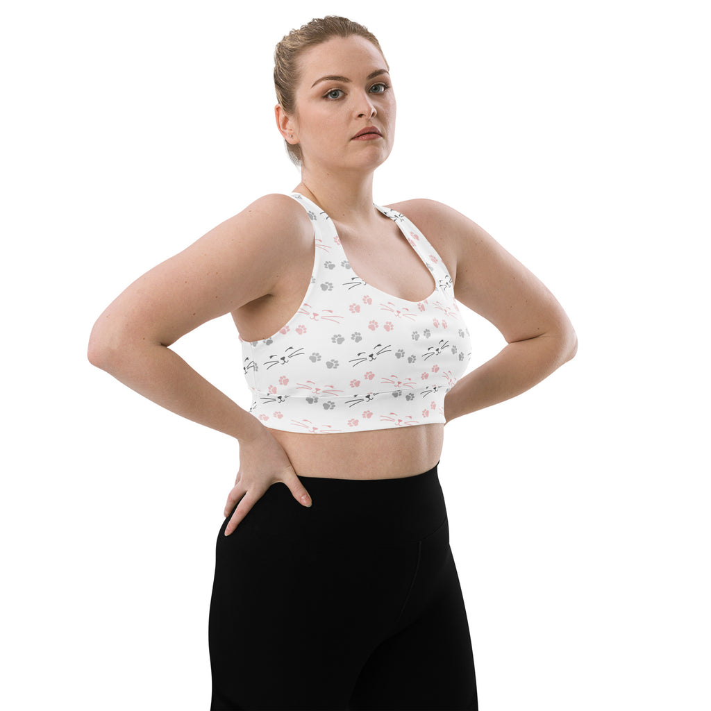 White longline sports bra with pink and gray cat paw print pattern buttery soft recycled fabric high intensity support