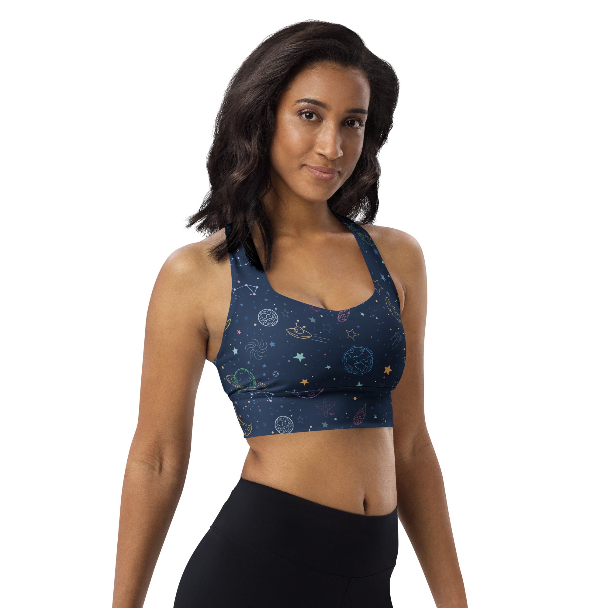 Dark blue space-themed longline sports bra with celestial patterns made from buttery soft recycled fabric for high intensity support