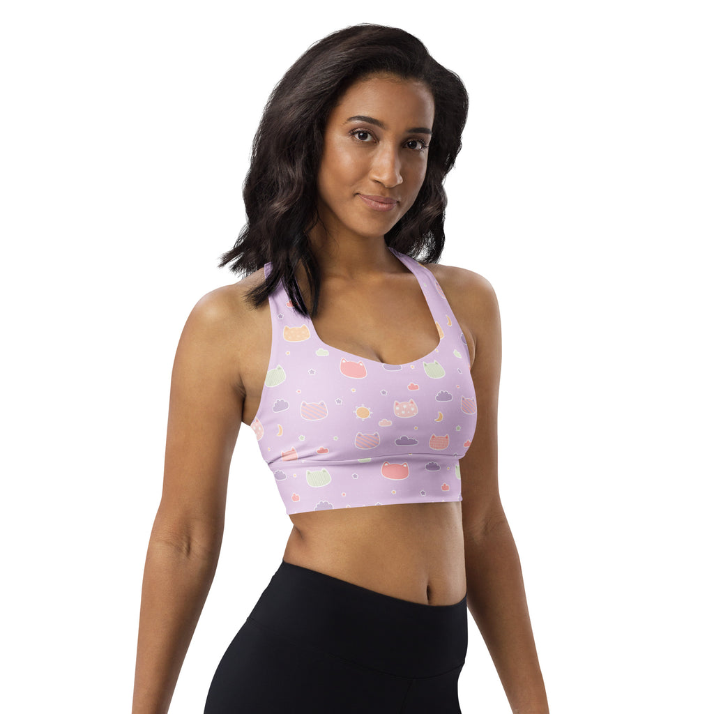 Lavender longline sports bra with pastel kawaii cat faces and clouds made from buttery soft recycled fabric