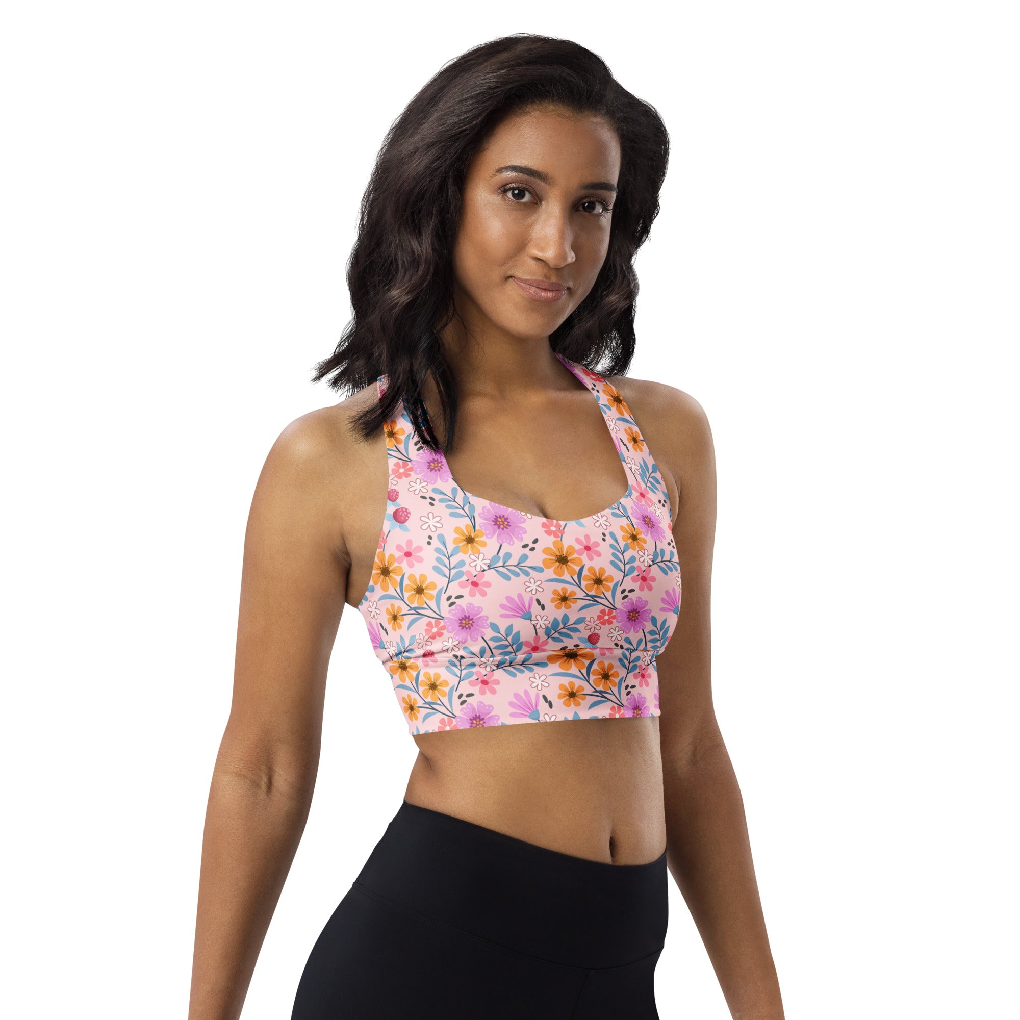 Women’s pink floral buttery soft recycled longline sports bra with halter neck straps and high intensity support