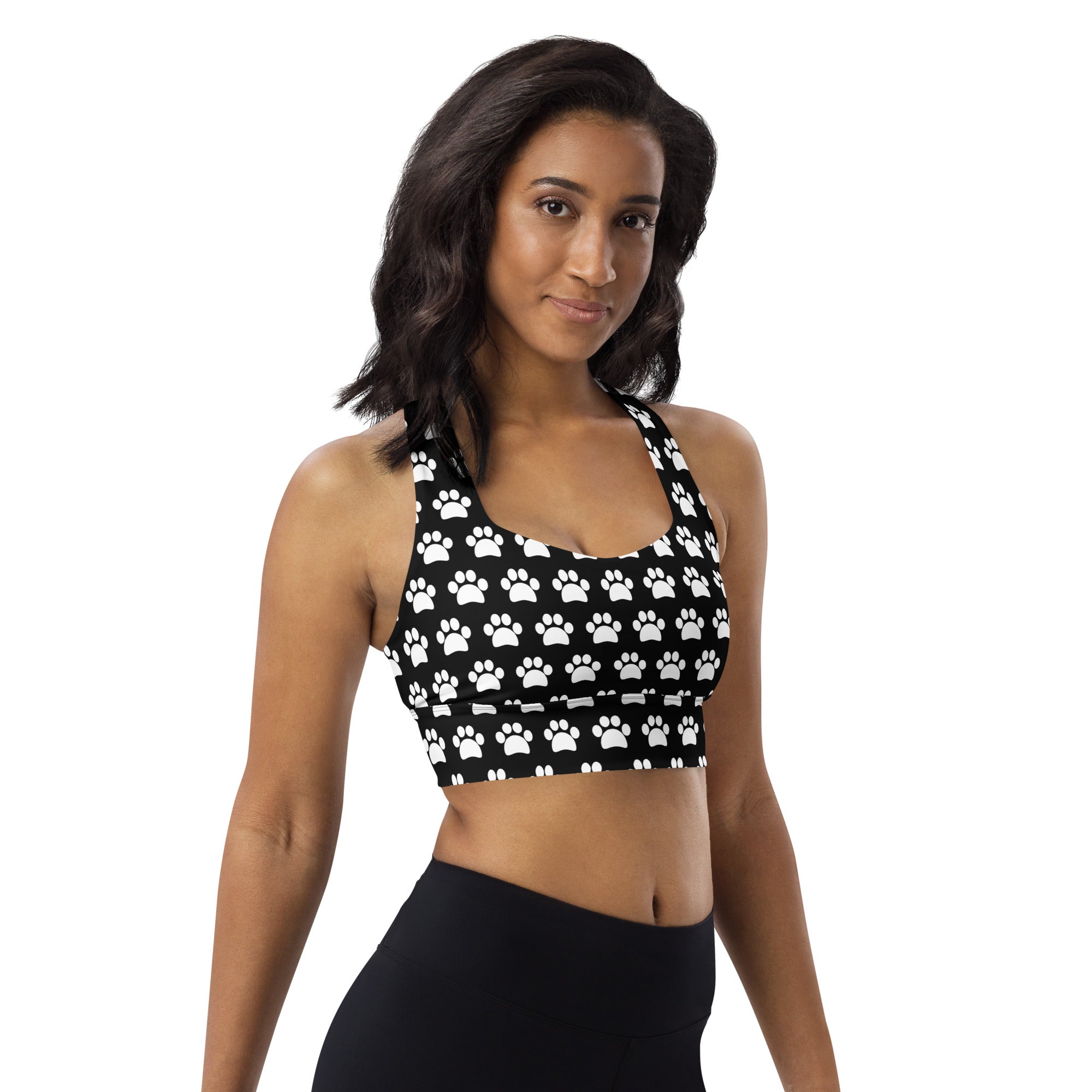 Women’s black longline sports bra with white paw print pattern buttery soft recycled fabric high intensity support
