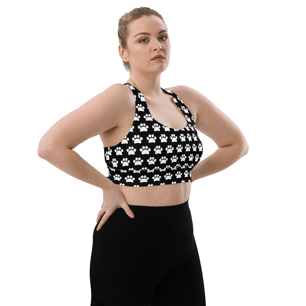 Women’s black and white paw print longline sports bra made from buttery soft recycled fabric for high intensity support