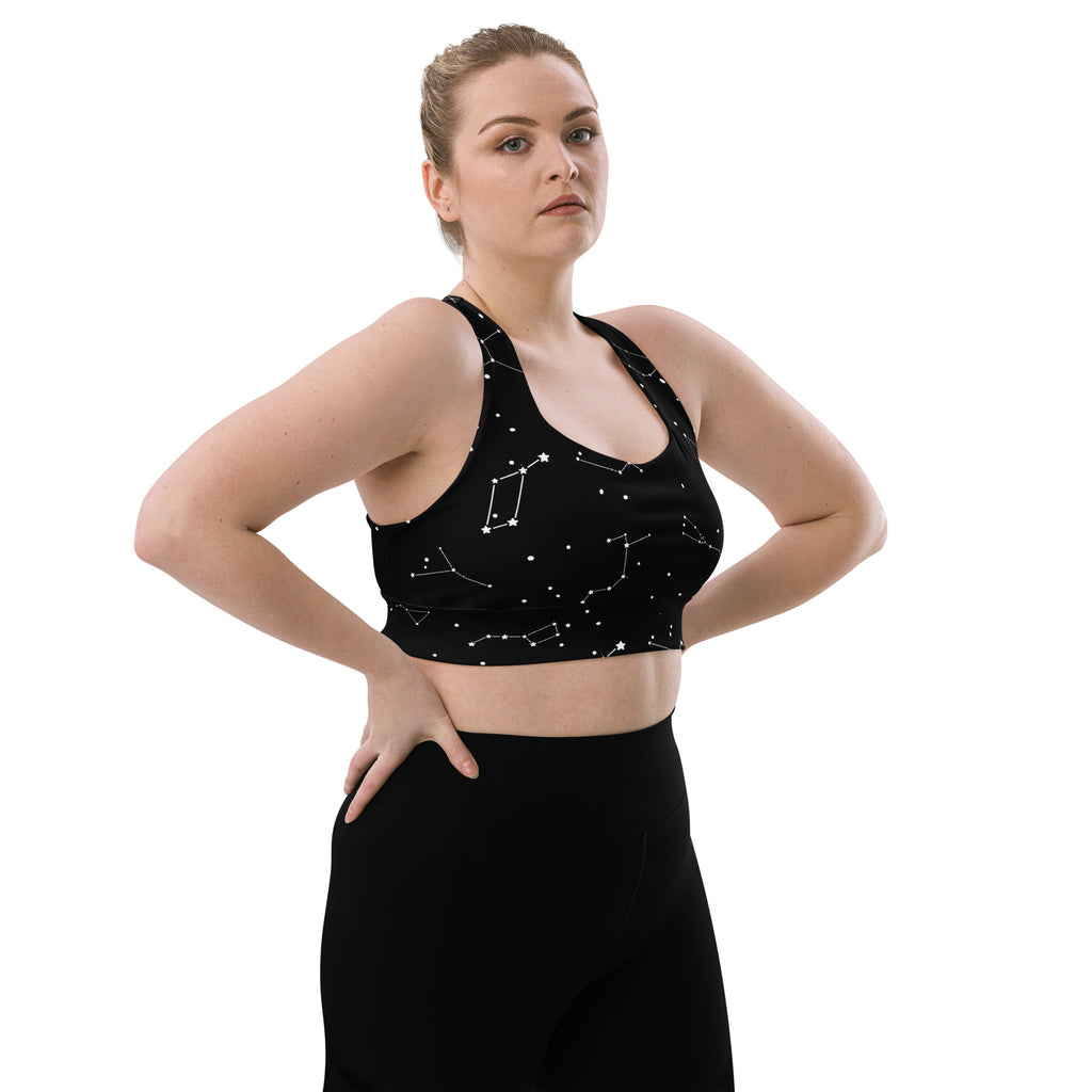 Women’s black star map sports bra with white constellation patterns buttery soft recycled fabric high intensity support