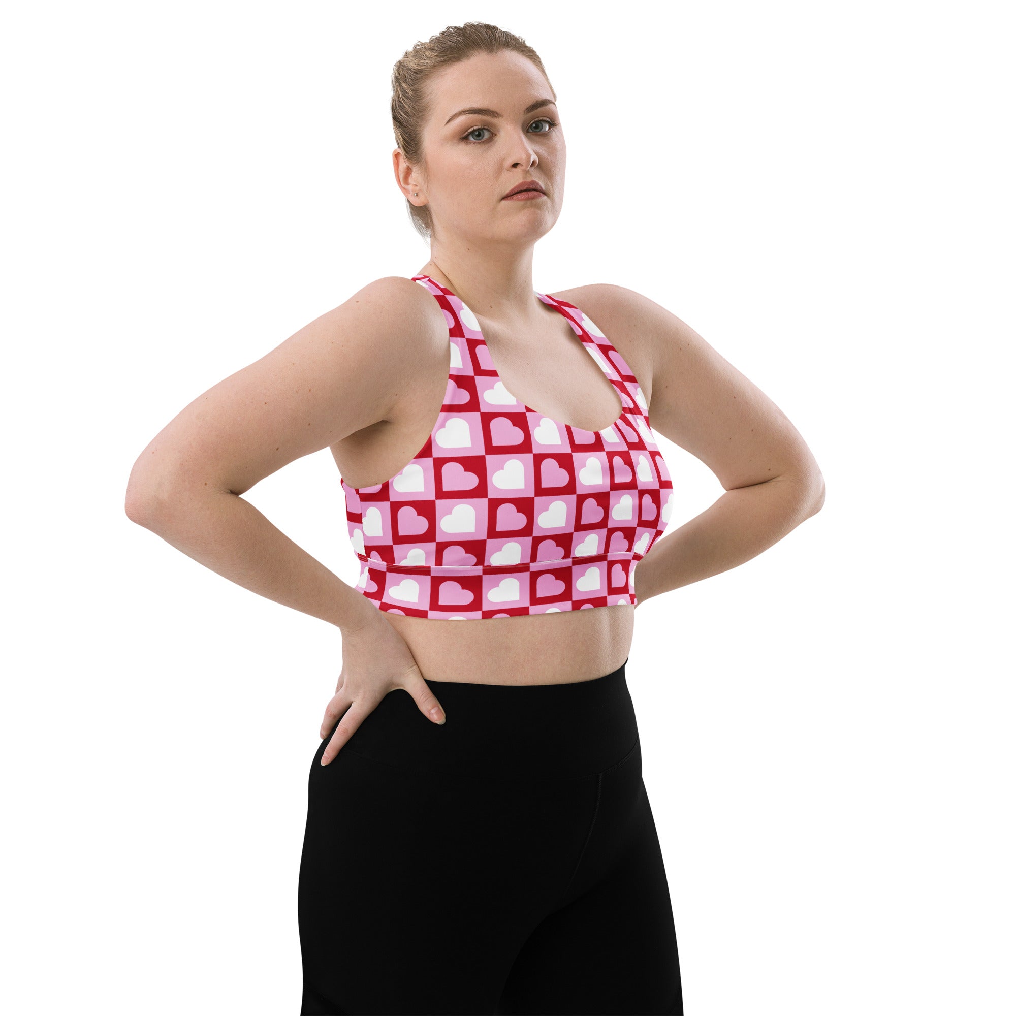 Women’s pink and white heart patterned buttery soft recycled longline sports bra with high intensity support