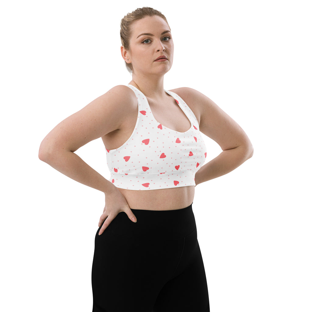 White sports bra with pink heart and dot pattern buttery soft recycled fabric high intensity support quick dry