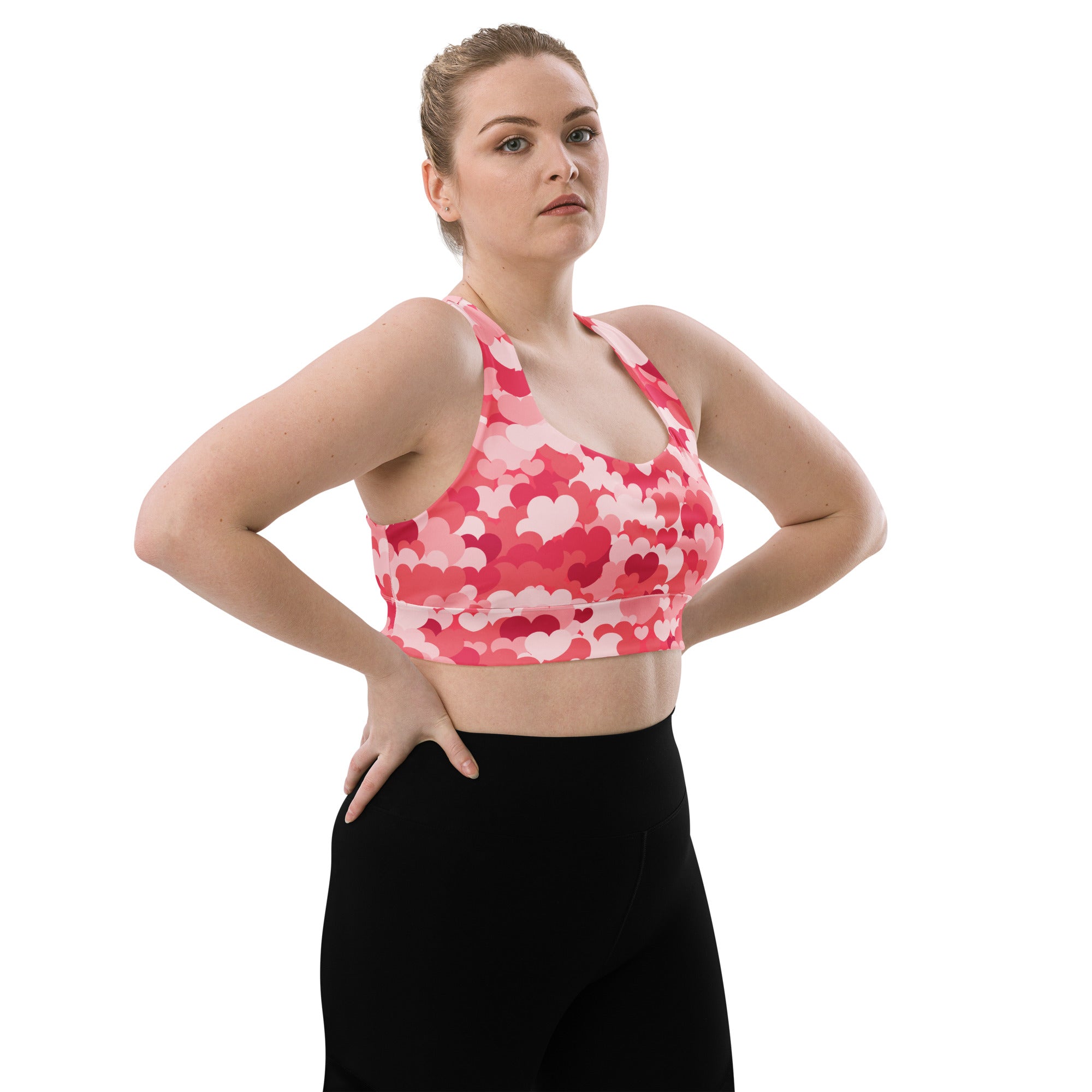 Pink heart-patterned longline sports bra with high intensity support removable padding quick dry and upf 50 plus